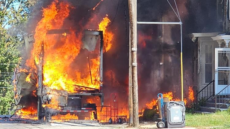 Engulfed box truck fire spreads, damages Sanford home
