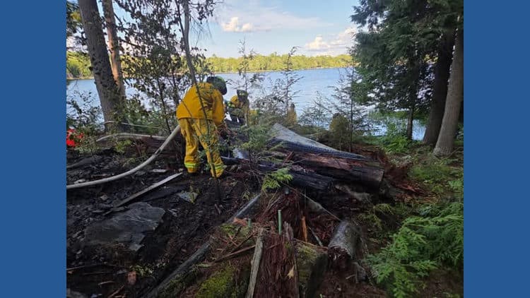 13 firefighters, a ranger, and a drone respond to fire on Pushaw Lake