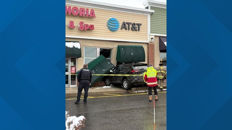 SUV crashes into Westbrook AT&T store; driver hospitalized after suspected medical event