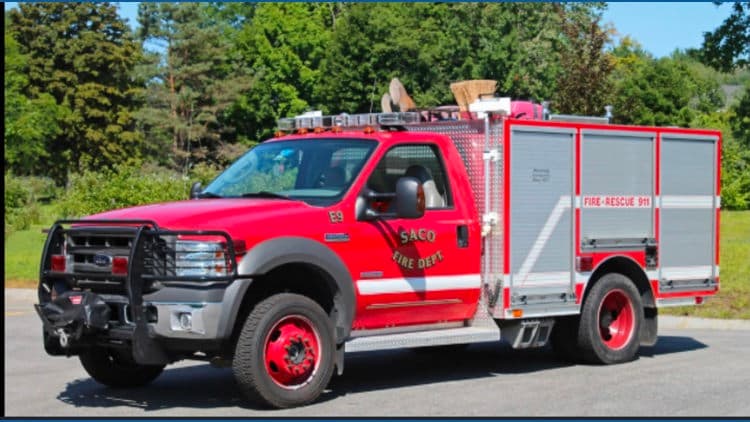 Fire departments battle large wood fire in Saco Sunday